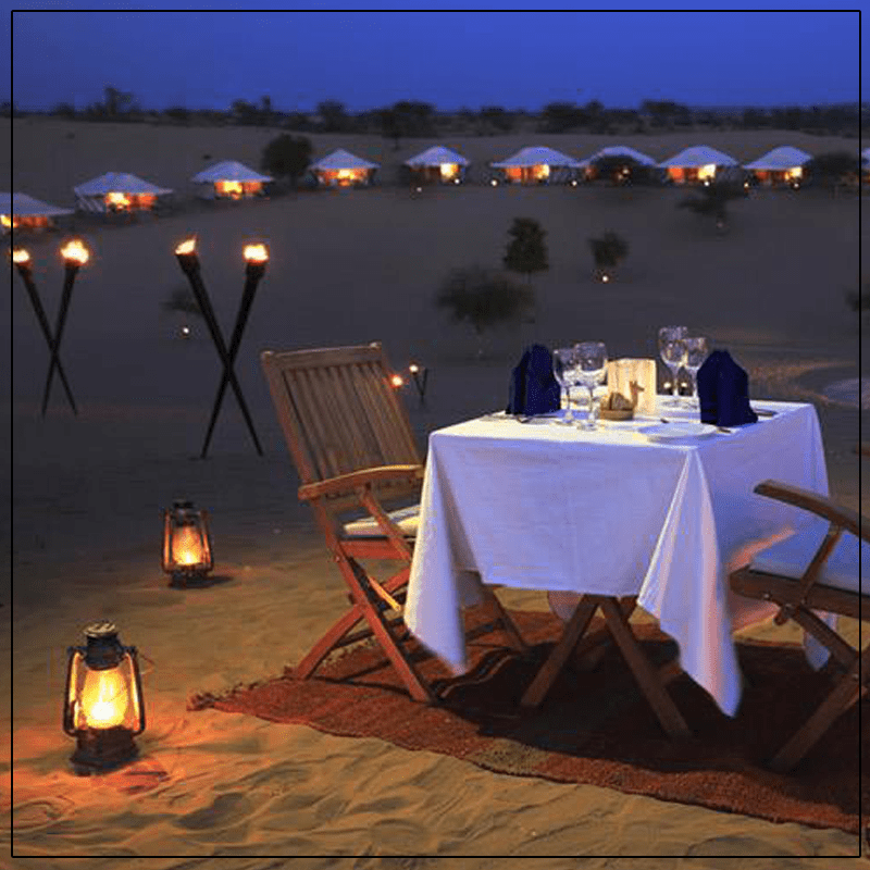 Enjoy the amazing dinner in middle of the desert of Rajasthan arranged by us
